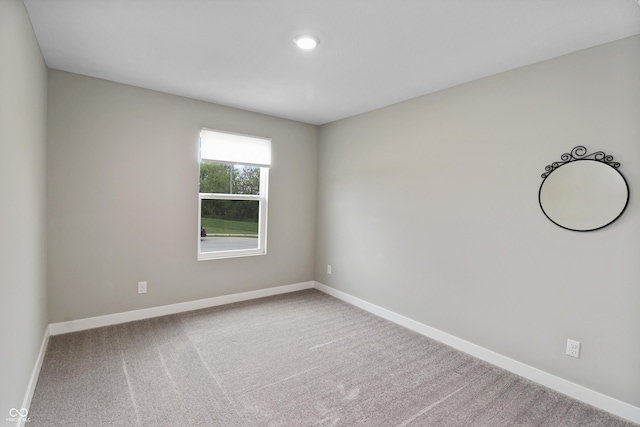 6917 Wolf Creek Ct, Whitestown, IN 46075 - carpeted empty room with baseboards and recessed lighting