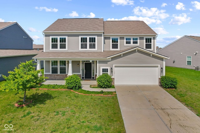 4539 Maldenhair Dr, Indianapolis, IN 46239 - view of front facade with covered porch, a front lawn, concrete driveway, a garage, and roof with shingles