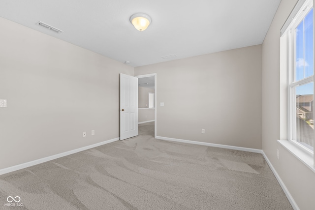 4539 Maldenhair Dr, Indianapolis, IN 46239 - spare room featuring carpet and baseboards