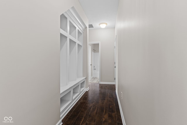 4539 Maldenhair Dr, Indianapolis, IN 46239 - mudroom featuring dark wood-style floors and baseboards