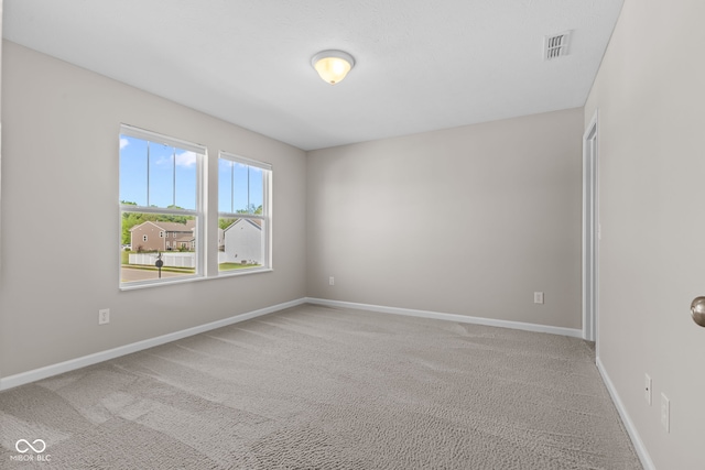 4539 Maldenhair Dr, Indianapolis, IN 46239 - spare room with light colored carpet and baseboards