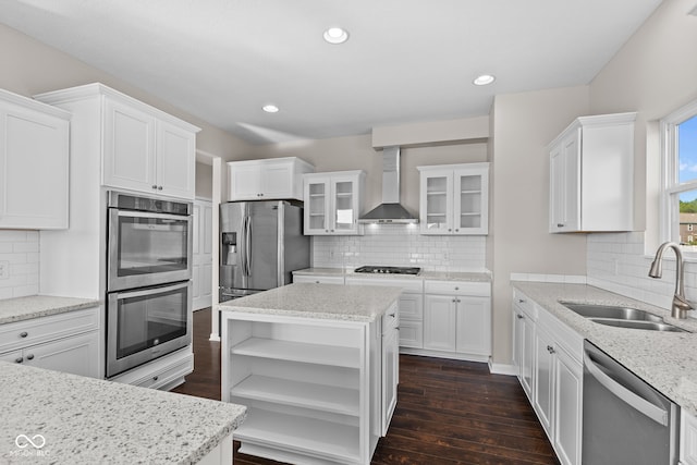 4539 Maldenhair Dr, Indianapolis, IN 46239 - kitchen featuring wall chimney range hood, stainless steel appliances, a sink, open shelves, and decorative backsplash