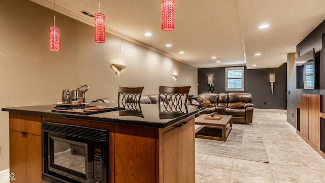 9804 Wentworth Ct, Carmel, IN 46032 - kitchen with black microwave, dark countertops, ornamental molding, recessed lighting, and light tile patterned floors