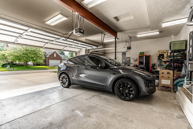 9804 Wentworth Ct, Carmel, IN 46032 - garage featuring a garage door opener