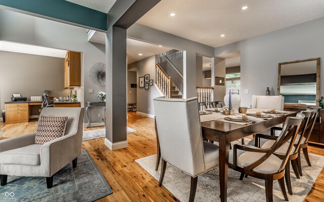 9804 Wentworth Ct, Carmel, IN 46032 - dining area with light wood-type flooring, stairs, recessed lighting, an office area, and baseboards