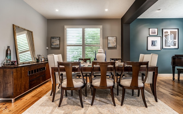 9804 Wentworth Ct, Carmel, IN 46032 - dining room featuring light wood-type flooring, recessed lighting, and baseboards