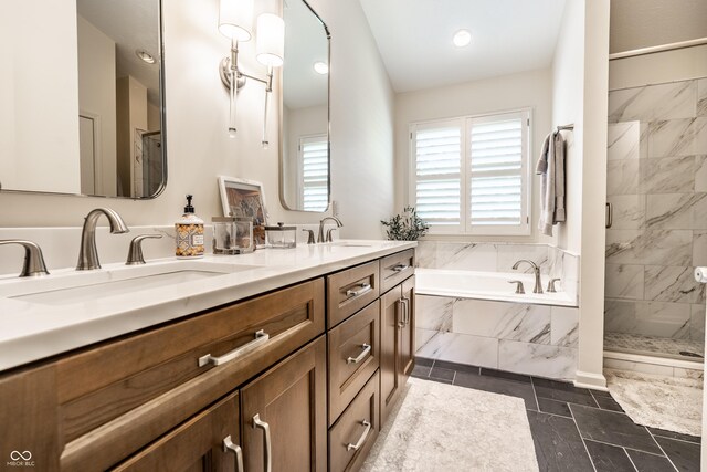 9804 Wentworth Ct, Carmel, IN 46032 - bathroom with a bath, double vanity, and a tile shower