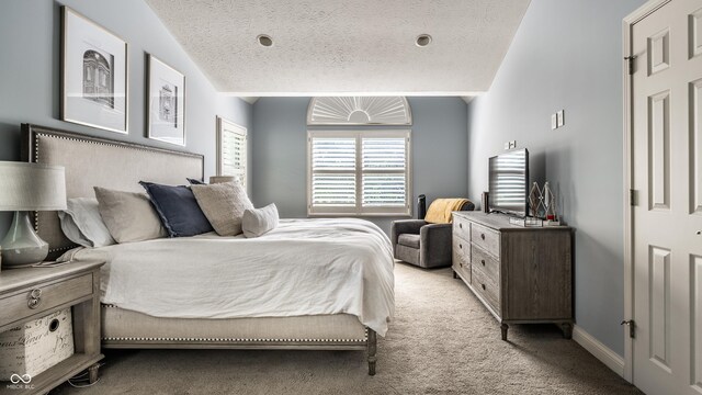 9804 Wentworth Ct, Carmel, IN 46032 - bedroom featuring light carpet, lofted ceiling, a textured ceiling, and baseboards