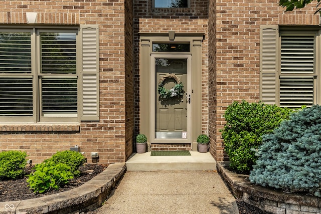 9804 Wentworth Ct, Carmel, IN 46032 - view of exterior entry featuring brick siding