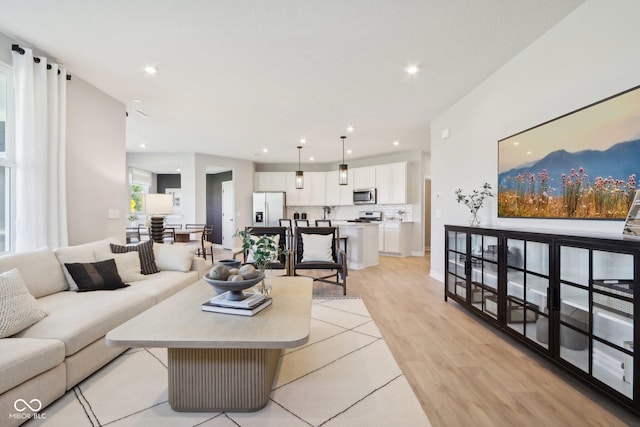 577 Dalton Way, Avon, IN 46123 - living area featuring light wood finished floors and recessed lighting