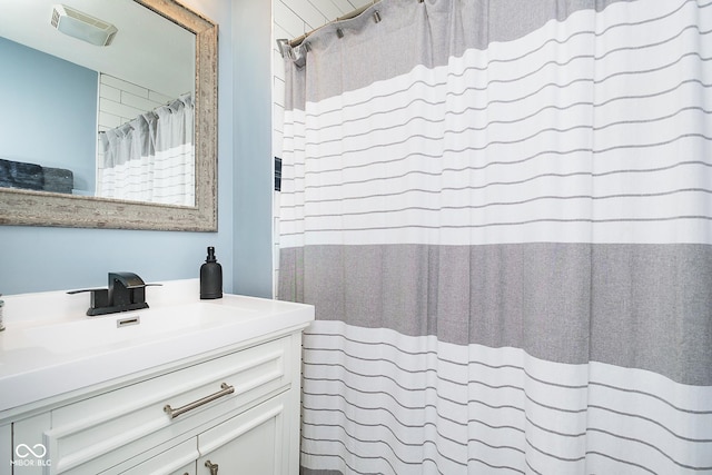 2209 W 9th St, Muncie, IN 47302 - full bathroom with vanity and a shower with curtain