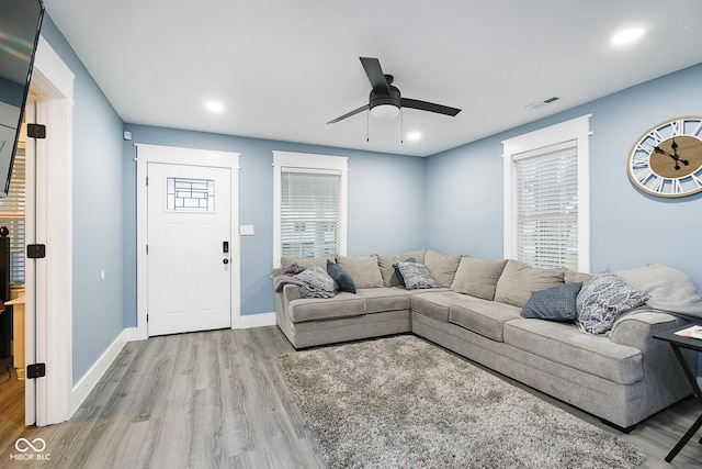 2209 W 9th St, Muncie, IN 47302 - living area featuring ceiling fan, wood finished floors, baseboards, and recessed lighting