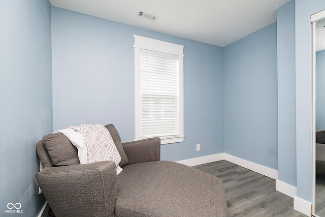 2209 W 9th St, Muncie, IN 47302 - sitting room with wood finished floors and baseboards