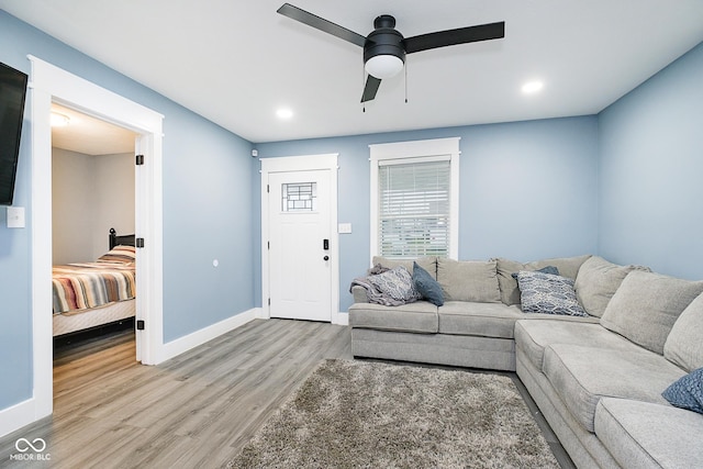 2209 W 9th St, Muncie, IN 47302 - living area with light wood finished floors, baseboards, a ceiling fan, and recessed lighting