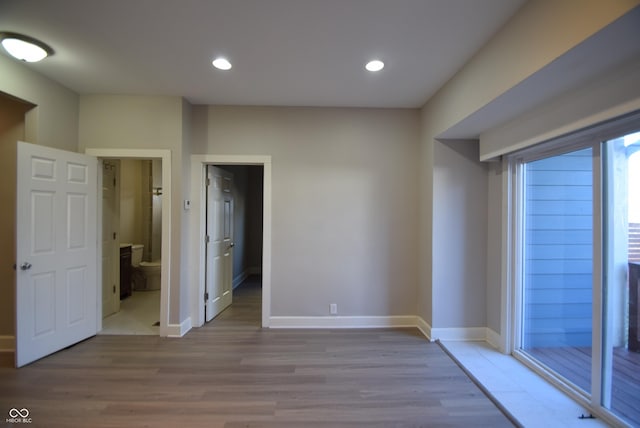 4231 Carrollton Ave, Indianapolis, IN 46205 - unfurnished room featuring wood finished floors, baseboards, and recessed lighting