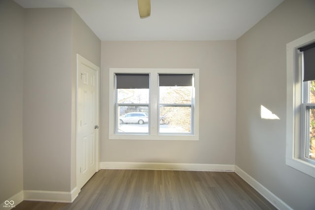 4231 Carrollton Ave, Indianapolis, IN 46205 - spare room with wood finished floors, baseboards, and ceiling fan