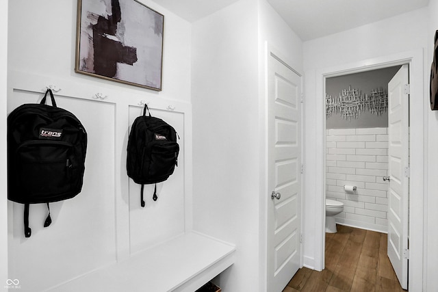 15387 Alperton Rd, Fishers, IN 46037 - mudroom with tile walls and dark wood-style floors