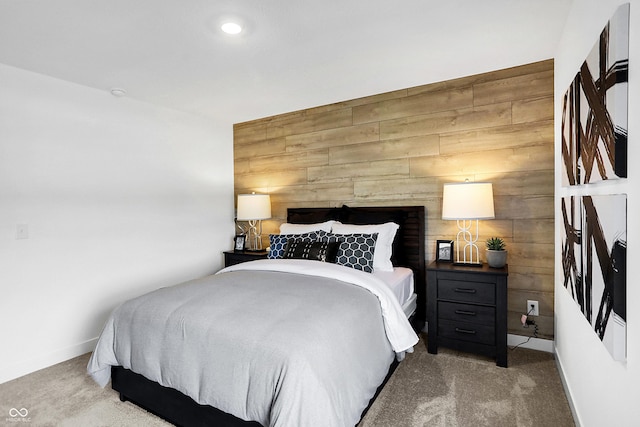 15387 Alperton Rd, Fishers, IN 46037 - carpeted bedroom featuring wood walls, baseboards, and an accent wall
