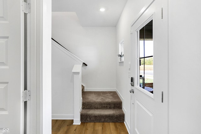 15387 Alperton Rd, Fishers, IN 46037 - stairway featuring wood finished floors, baseboards, and recessed lighting