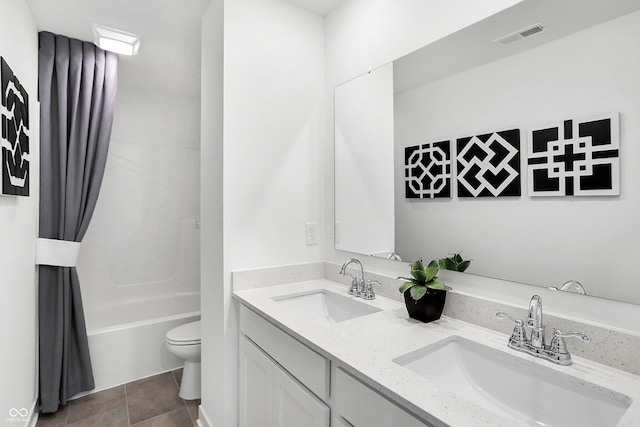 15387 Alperton Rd, Fishers, IN 46037 - full bathroom featuring toilet, double vanity, shower / tub combo with curtain, and tile patterned floors