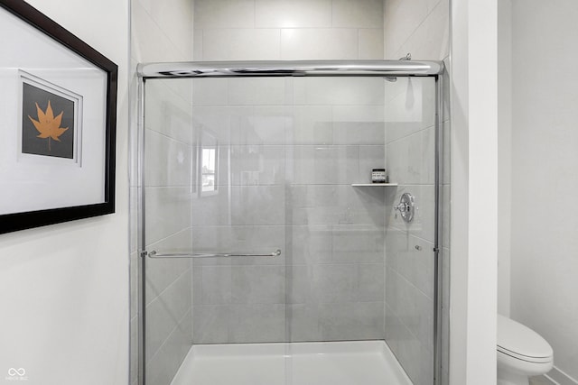 15387 Alperton Rd, Fishers, IN 46037 - bathroom featuring a stall shower and toilet