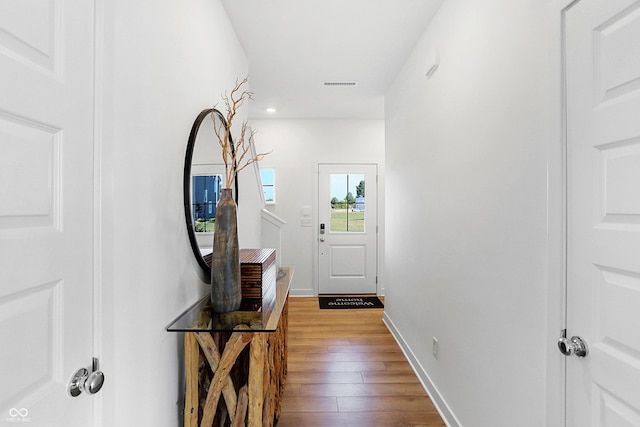 15387 Alperton Rd, Fishers, IN 46037 - doorway to outside featuring hardwood / wood-style flooring, recessed lighting, and baseboards