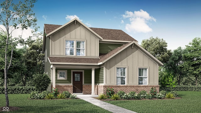 15387 Alperton Rd, Fishers, IN 46037 - view of front facade with brick siding, board and batten siding, a shingled roof, and a front lawn