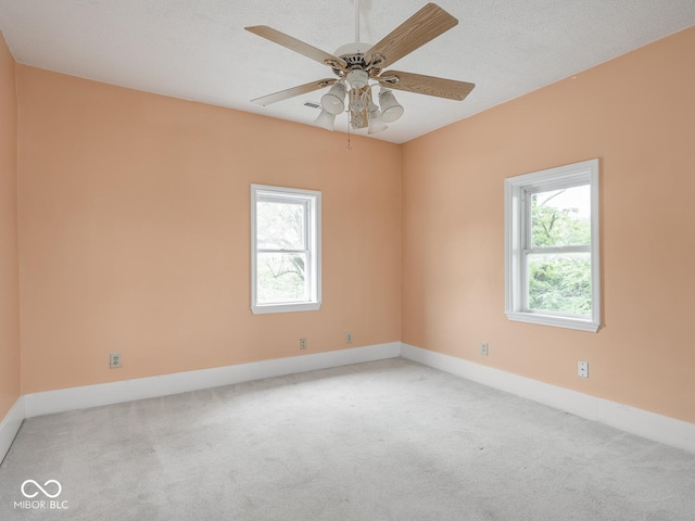 914 English Ave, Indianapolis, IN 46203 - unfurnished room with carpet flooring, baseboards, and ceiling fan