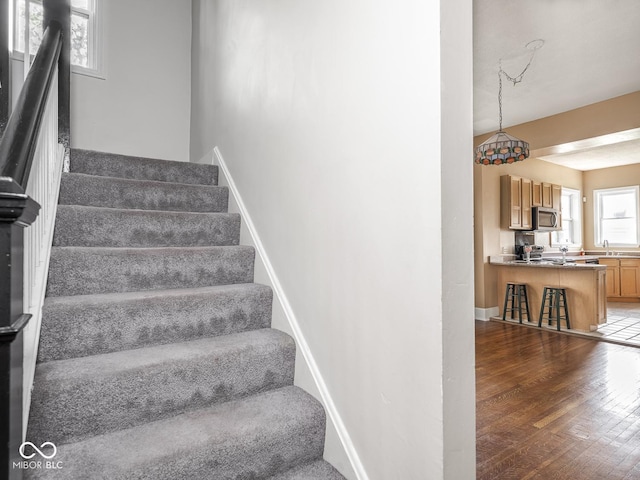 914 English Ave, Indianapolis, IN 46203 - stairway with wood finished floors and baseboards