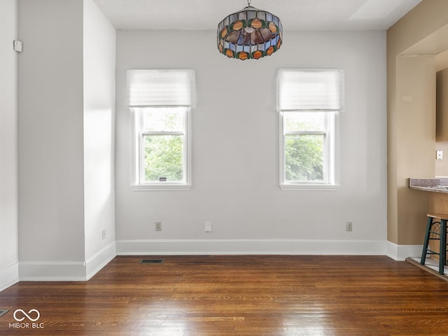 914 English Ave, Indianapolis, IN 46203 - unfurnished dining area featuring wood finished floors and baseboards