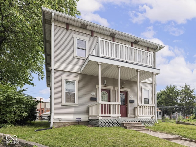 914 English Ave, Indianapolis, IN 46203 - view of front of home with a balcony and covered porch