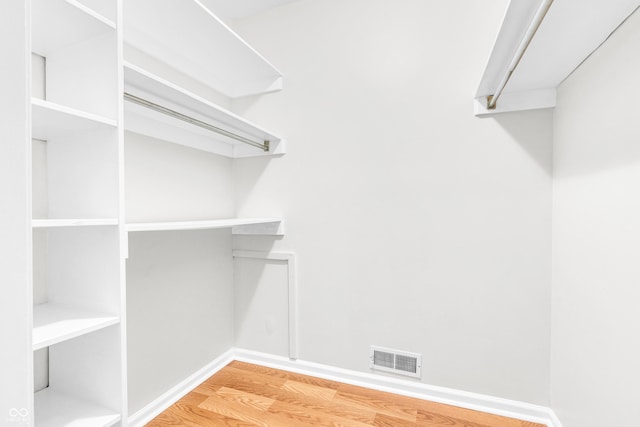 2267 Rome Dr Unit A, Indianapolis, IN 46228 - walk in closet featuring wood finished floors