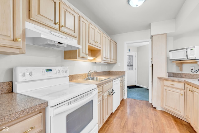 2267 Rome Dr Unit A, Indianapolis, IN 46228 - kitchen featuring white appliances, under cabinet range hood, light wood finished floors, and light countertops