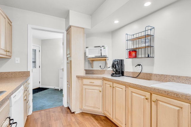 2267 Rome Dr Unit A, Indianapolis, IN 46228 - kitchen featuring white appliances, light brown cabinets, light countertops, recessed lighting, and light wood-style flooring