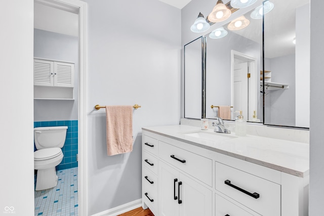 2267 Rome Dr Unit A, Indianapolis, IN 46228 - bathroom with vanity, tile walls, and tile patterned floors