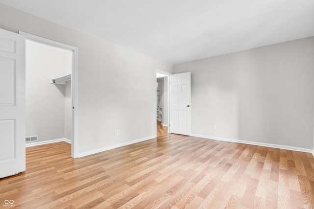 2267 Rome Dr Unit A, Indianapolis, IN 46228 - empty room with light wood finished floors