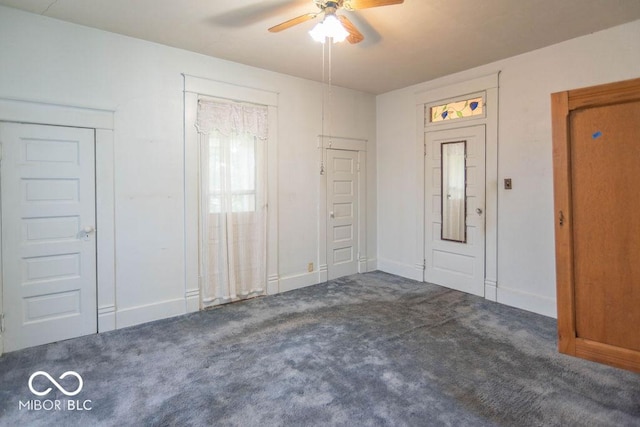 4526 Iowa St, Clayton, IN 46118 - foyer with a ceiling fan, carpet, and baseboards