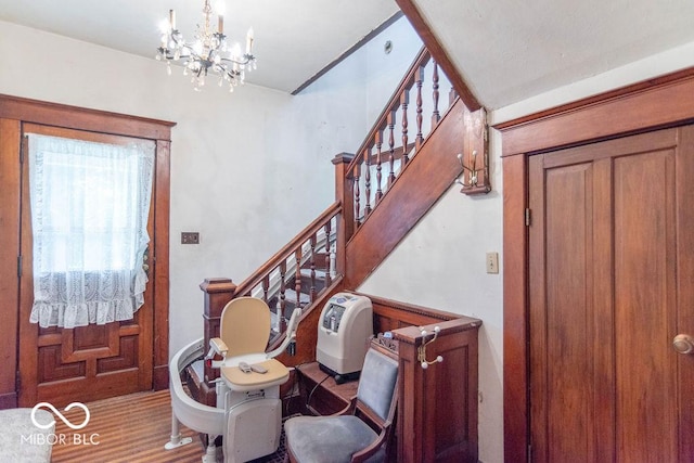 4526 Iowa St, Clayton, IN 46118 - entrance foyer with stairway and a chandelier