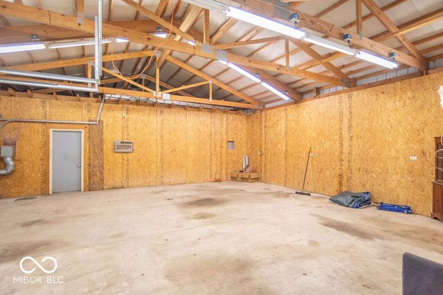 4526 Iowa St, Clayton, IN 46118 - garage featuring a wall mounted AC