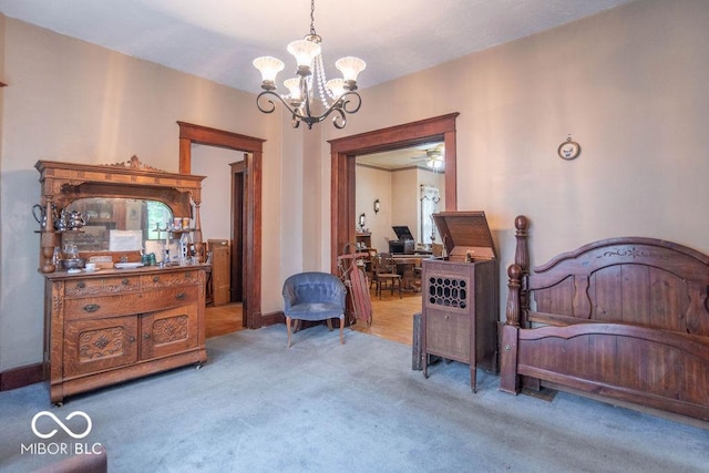 4526 Iowa St, Clayton, IN 46118 - living area featuring carpet floors and a chandelier