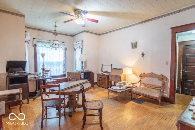 4526 Iowa St, Clayton, IN 46118 - dining space with ceiling fan, ornamental molding, hardwood / wood-style floors, and an office area
