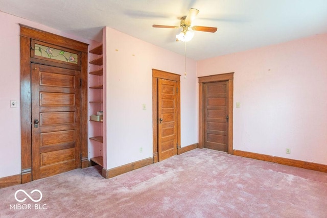 4526 Iowa St, Clayton, IN 46118 - unfurnished bedroom featuring carpet floors, baseboards, and a ceiling fan