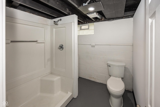 4933 W 13th St W, Speedway, IN 46224 - full bathroom with finished concrete flooring, a shower stall, and toilet