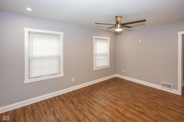4933 W 13th St W, Speedway, IN 46224 - empty room featuring a ceiling fan, baseboards, dark wood finished floors, and recessed lighting
