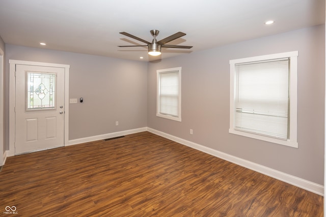 4933 W 13th St W, Speedway, IN 46224 - empty room featuring dark wood-type flooring, ceiling fan, baseboards, and recessed lighting