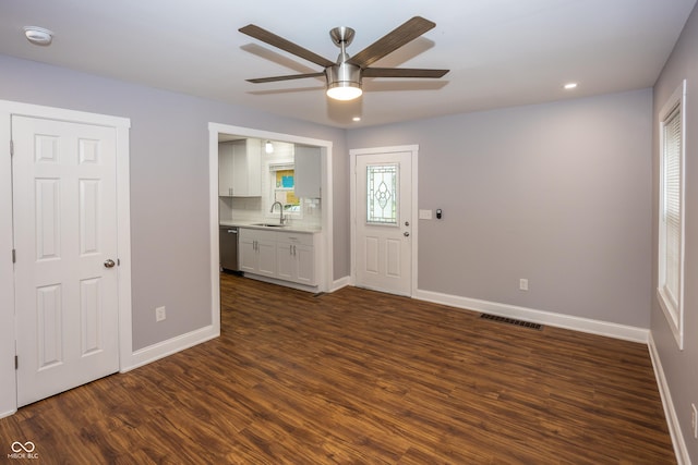 4933 W 13th St W, Speedway, IN 46224 - empty room with a sink, baseboards, a ceiling fan, dark wood-style floors, and recessed lighting