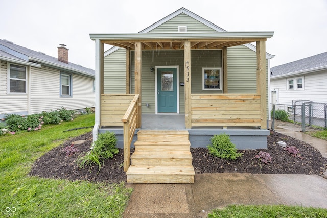 4933 W 13th St W, Speedway, IN 46224 - shotgun-style home featuring covered porch