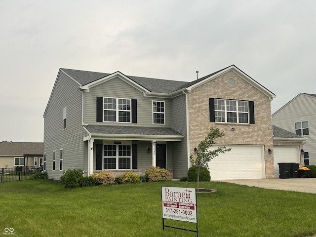 1287 Highland Lake Way, Brownsburg, IN 46112 - traditional home featuring an attached garage, driveway, brick siding, and a shingled roof