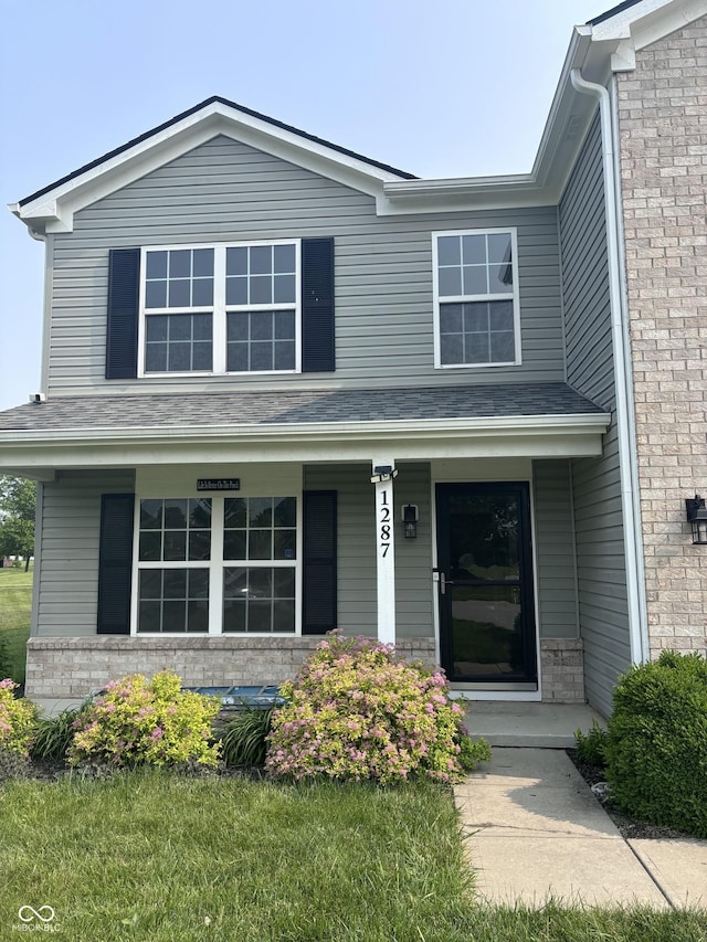 1287 Highland Lake Way, Brownsburg, IN 46112 - view of front facade with covered porch and brick siding