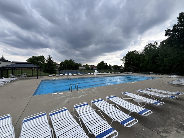 1287 Highland Lake Way, Brownsburg, IN 46112 - community pool featuring a gazebo and a patio area